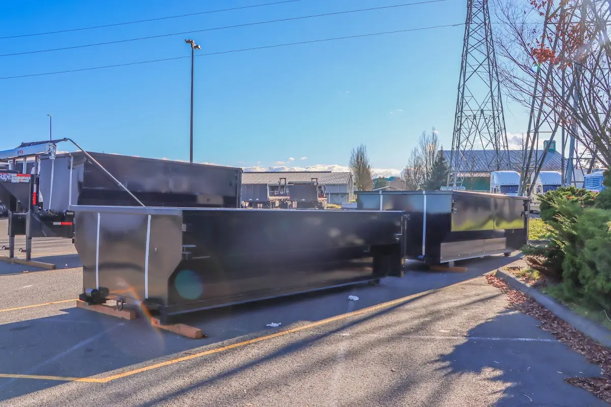 Roll-off dumpster ready for waste disposal at job site for Concrete Dumpster Rental in Taylorsville